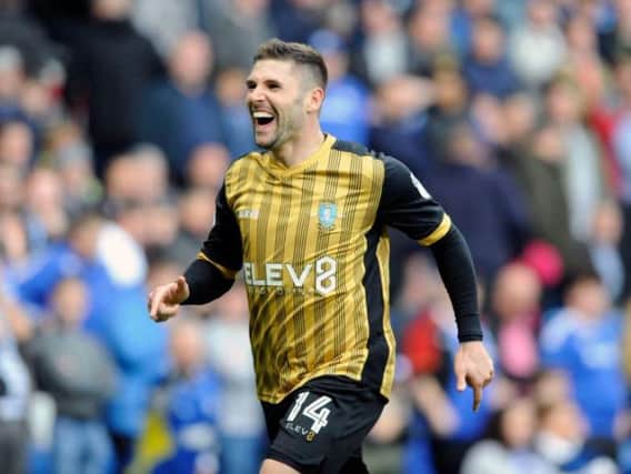 Gary Hooper celebrates after scoring the opening goal for Sheffield Wednesday against Cardiff City