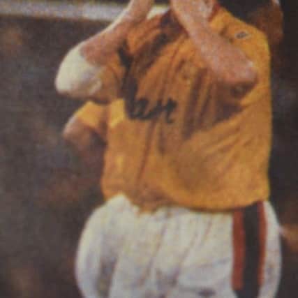 Sheffield United's John Gannon blows a kiss to the traveling supporters