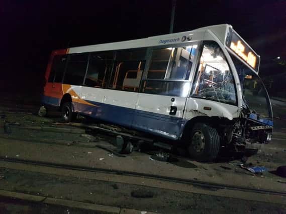 A bus was badly damaged in a crash in Sheffield this morning
