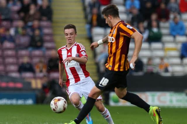 Stefan Scougall, on his feet, during Sheffield United's match at Bradford City three years ago