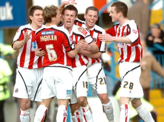 Neill Collins, right, made his Blades debut against Wednesday at Hillsborough in 2006