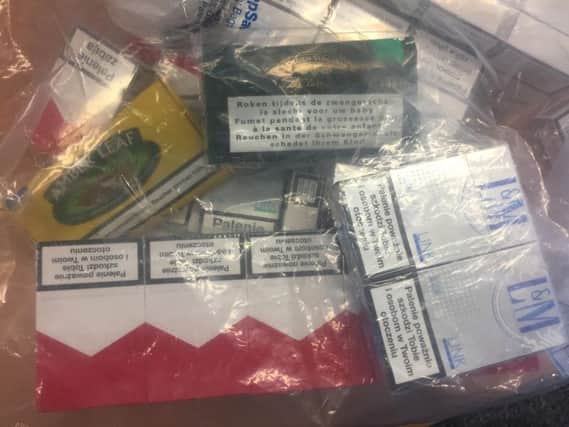 Some of the illicit cigarettes seized from the store