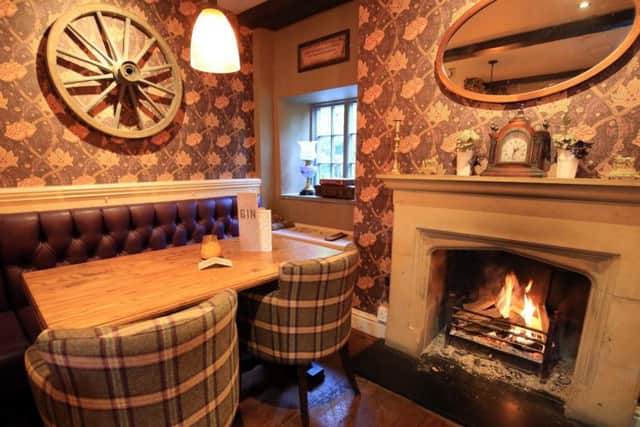 Cosy fireside seating at The Waggon & Horses