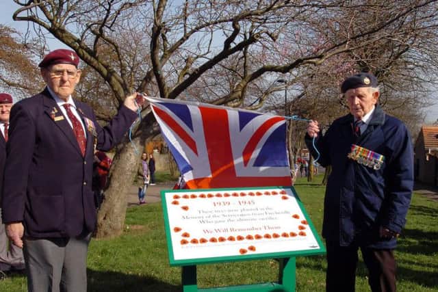 Frecheville veterans unveil a plaque to mark the memorial trees in Heathfield Road, 2014.