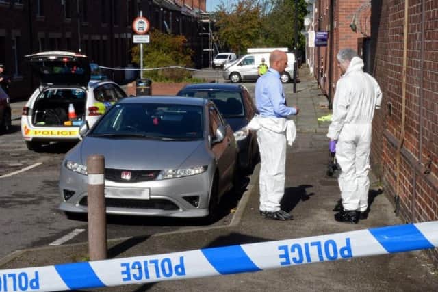 Forensic officers at the scene of the attack in Hexthorpe on Tuesday