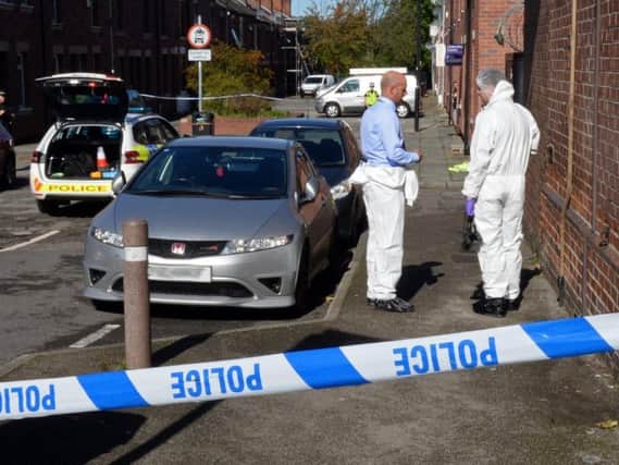 Forensic officers at the scene of the attack in Hexthorpe on Tuesday