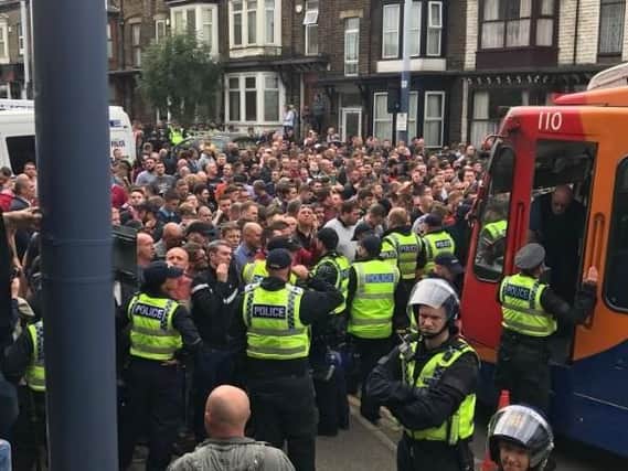 Police hold fans back on Middlwood Road. Picture: Jonny Swain