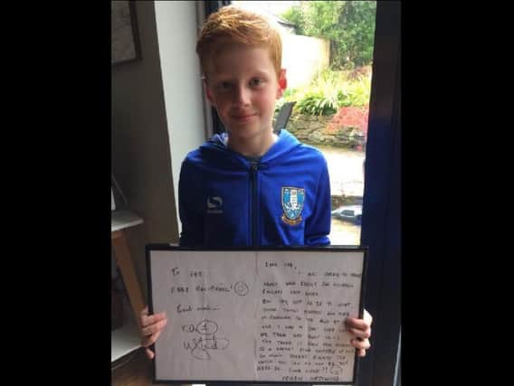 Seb Webster proudly shows off his letter from Keiren Westwood.