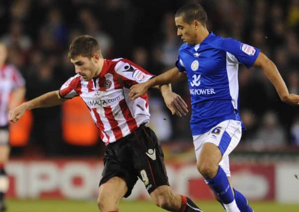 Ched Evans holds off former Blade  Kyle Naughton