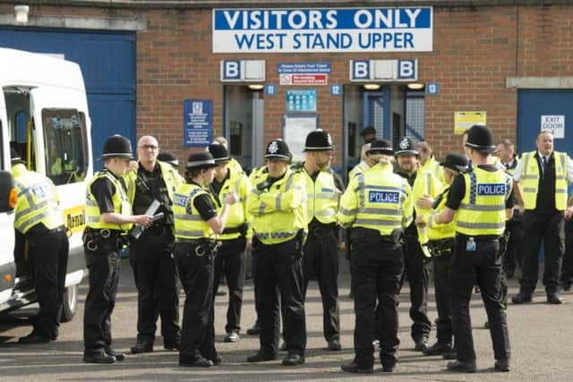 Police outside the Leppings Lane away stand before kick-off