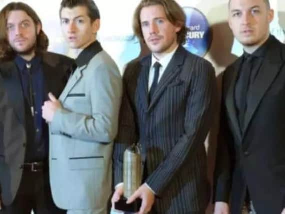 Arctic Monkeys are, from left, bassist Nick O'Malley, singer Alex Turner, guitarist Jamie Cook and drummer Matt Helders.