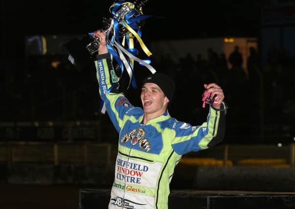 Josh Bates with the trophy after Sheffield Tigers win rhe championship. Pic: Phil Hilton
