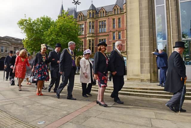 3 Oct 2017...... Local dignitaries follow Sheffield's new Master Cutler Ken Cooke as he leads the prosession from the Cutlers' Hall to the Cathedral. Picture Scott Merrylees