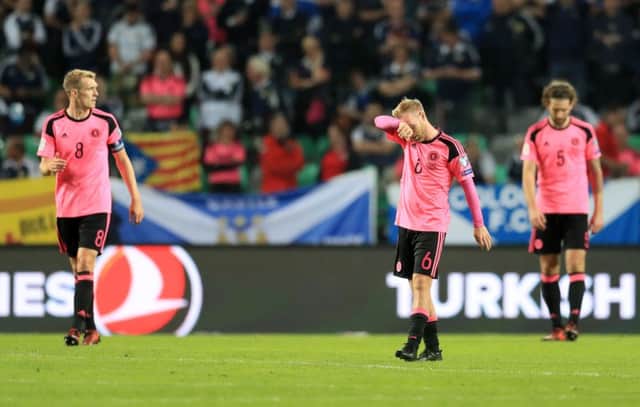 Barry Bannan cuts a dejected figure as Scotland miss out on a play-off place for the 2018 World Cup