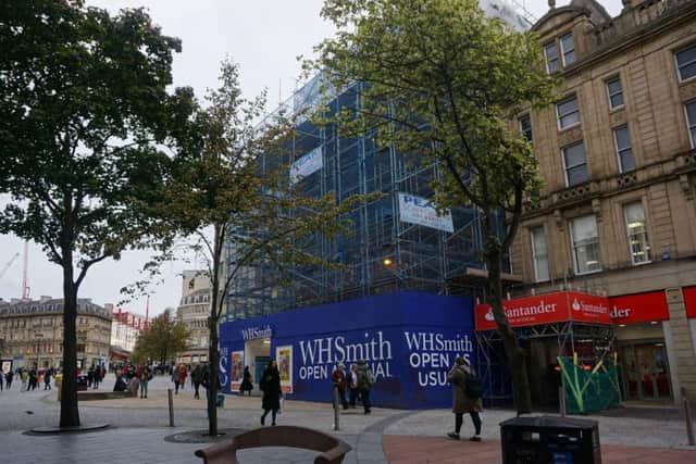 WH Smith is also covered in scaffolding.