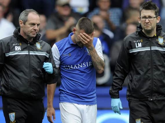 Jack Hunt was forced off injured in Sunday's win for Sheffield Wednesday against Leeds United
