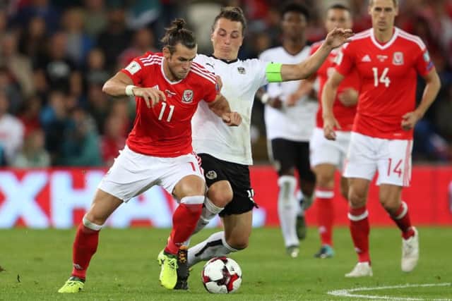 Wales' Gareth Bale passed on some of his knowledge to David Brooks before withdrawing through injury