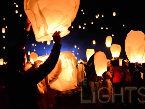 Sky lanterns are released during a festival in Austin, Texas (pic: The Lights Fest)