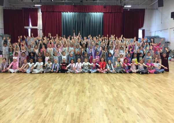 Over 300 pupils have raised over Â£300 for charity - just be going to school wearing their pyjamas. The youngsters, who all attend Razzamataz Theatre School,Meadowhead, all  agreed to dance, sing and act in their nightwear to raise money for the companys charity Future Fund.