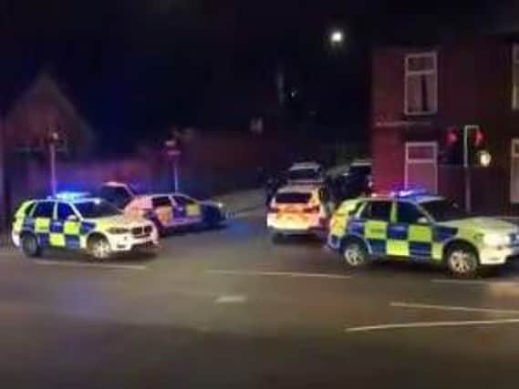 Police surround a vehicle on Catch Bar Lane in Hillsborough. Video: Daniel Staniforth