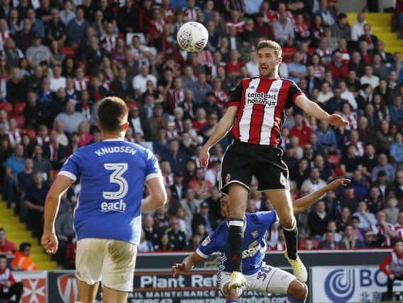 Chris Basham rises to head in the game's only goal as Sheffield United beat Ipswich Town