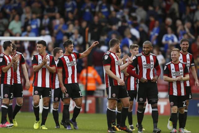 Sheffield United players celebrate their 1-0 win over Ipswich Town