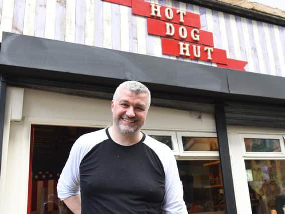 Justin Shore is the owner of Hot Dog Hut on Castle Street