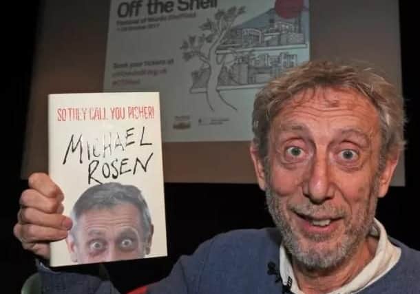 Michael Rosen with his latest book.