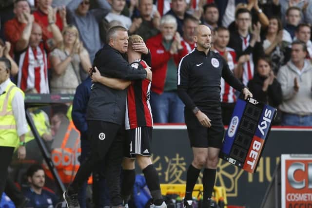 Chris Wilder is close to his players but demands plenty from them: Simon Bellis/Sportimage