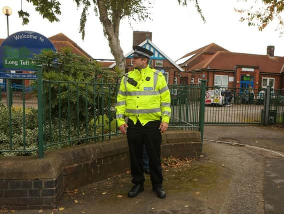 Police outside primary school - Picture: SWNS