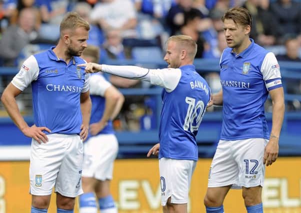 From left to right: Jordan Rhodes, Barry Bannan and Glenn Loovens