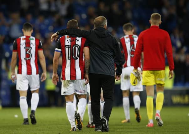 Chris Wilder had to pick up his players after defeat at Cardiff earlier in the season.