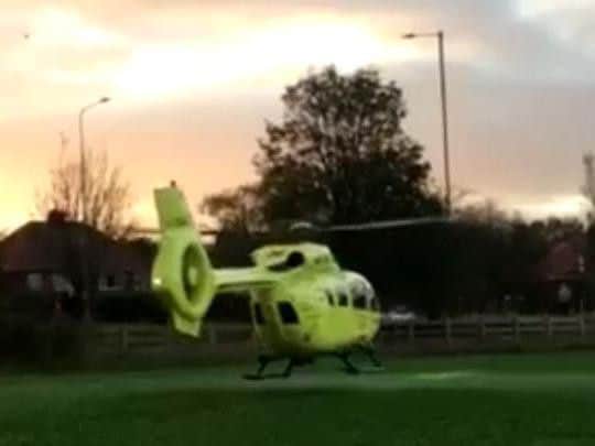 The helicopter takes off.