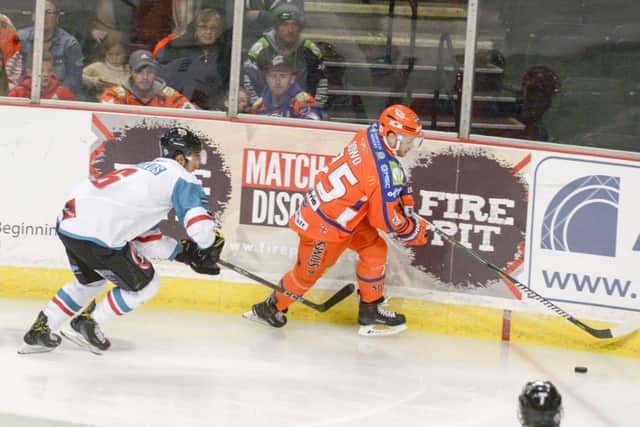 Sheffield Steelers v Belfast Giants
Steelers Robert Dowd holds off and defends