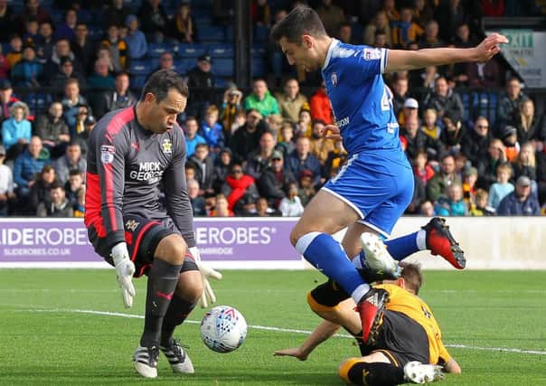 Picture by Gareth Williams/AHPIX.com; Football; Sky Bet League Two; Cambridge United v Chesterfield FC; 21/10/2017 KO 15.00; Cambs Glass Stadium; copyright picture; Howard Roe/AHPIX.com;Jordan Flores is denied by Cambridge keeper David Forde