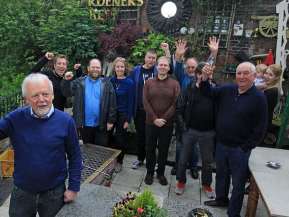 Mark Powell and fellow community shareholders at The Gardeners Rest