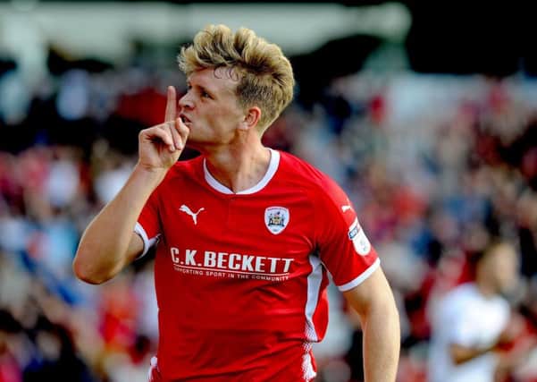 Cameron McGeehan, of Barnsley, celebrates scoring his team's second goal of the match against Middlesbrough