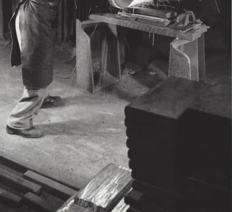 Swing grinding of stainless slabs  removing surface defects prior to rolling, mid 1950s Samuel Fox and Co.