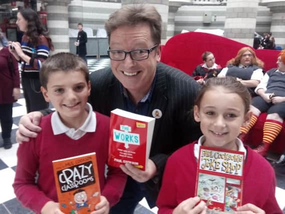 Poet Paul Cookson with youngsters from Town Field Primary School at the Doncaster Book Awards launch