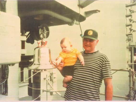 Bob Frith aboard the third HMS Sheffield with his grandson Ben McNally, now aged 18