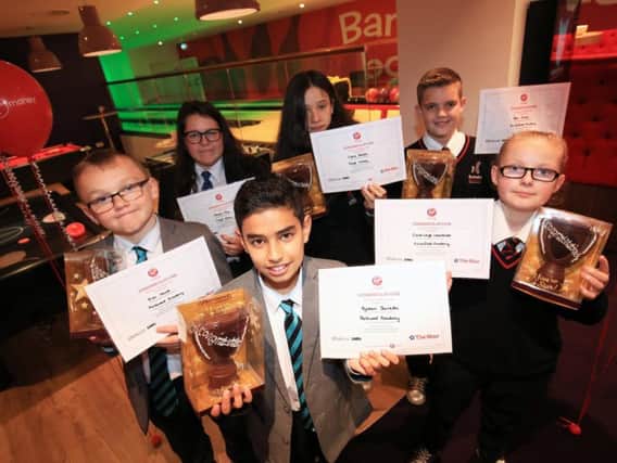 The super six with their certificates. Photo: The Star/Chris Etchells