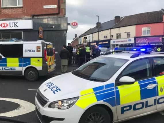 Armed robbers are on the run after a hold up in Sheffield