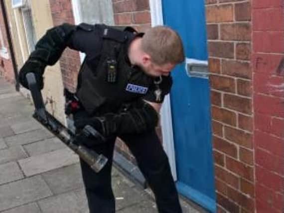Police officers raided three homes in Eastwood, Rotherham
