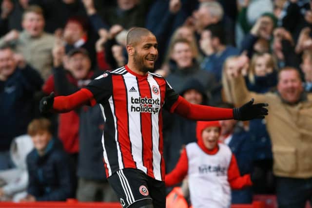 Leon Clarke celebrates the first of his four goals