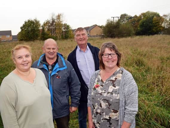 Parish Councillors Sue Tate, Fred Gee, Chairman, Dave Barrow and Anne Flanagan, Clerk, pictured, by the planned site of new play area and allotments. Picture: Marie Caley NDFP Play Area MC 1