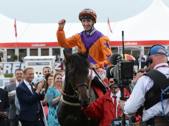 George Baker after winning the 2016 St Leger on Harbour Law.