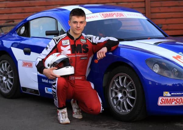 James Taylor (Rotherham) with the Ginetta Junior G40 race car he will be driving after winning the Ginetta Junior Scholarship 2018