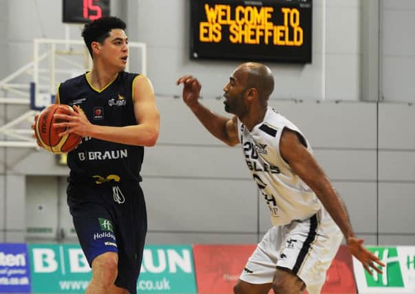 Sheffield Sharks' Colin Sing looks for a pass against Newcastle Eagles.