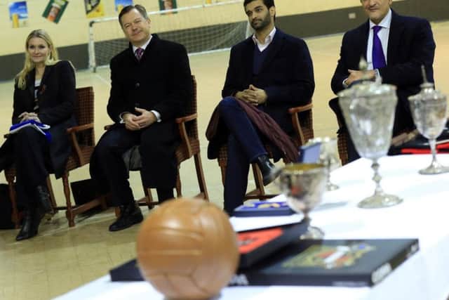 Hassan al-Thawadi, second from the right, the head of Qatar's 2022 World Cup committee, visited Sheffield to view the site of the original site of the ground of the world's oldest football club Sheffield FC.