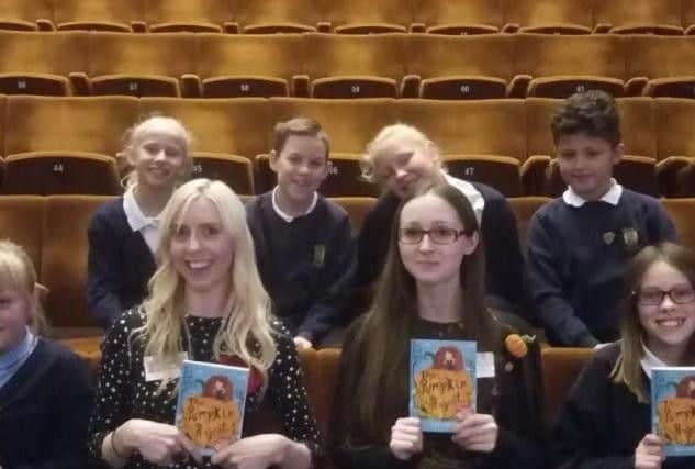 Authors Katie Smith, left, and Sarah Alexander with the children at the ceremony.